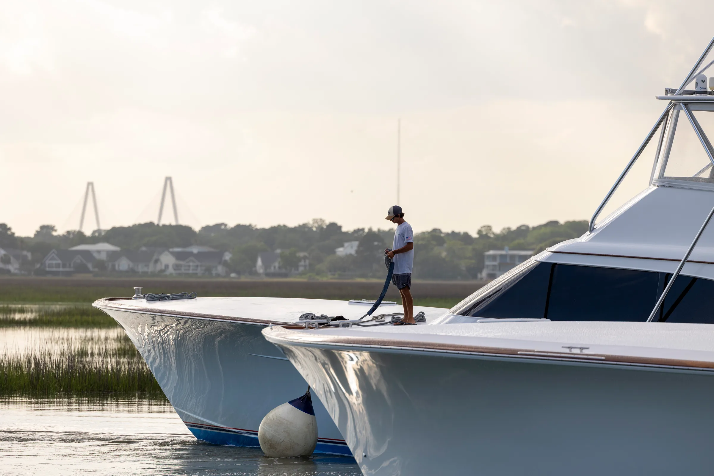 Two sportfishing yachts on the marsh at Toler's Cove Marina near Charleston Harbor