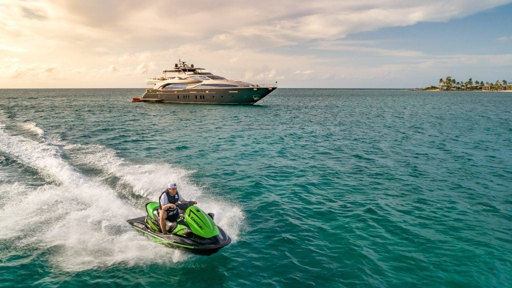 Jet ski alongside 116 Azimut tail lights