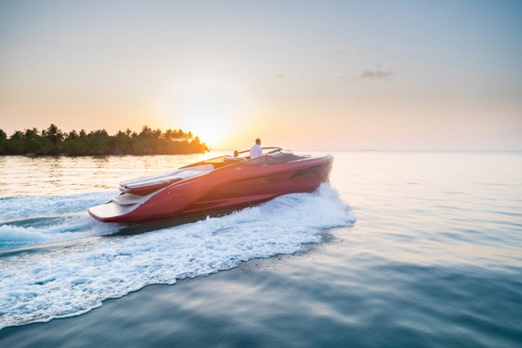 Princess Yachts R35 running in the ocean with sunsent in the background