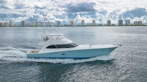 2010 Viking 82’ Convertible “Nina Marie” moving in the water.