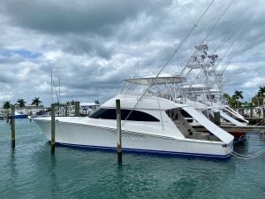 2013 Viking 61’ Convertible “Heads Up” sitting at a dock.