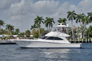 2015 Viking 52’ Convertible “Patti Anne” moving in the water.