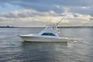 2005 Viking 48’ Convertible “Fins Up” sitting in the water.