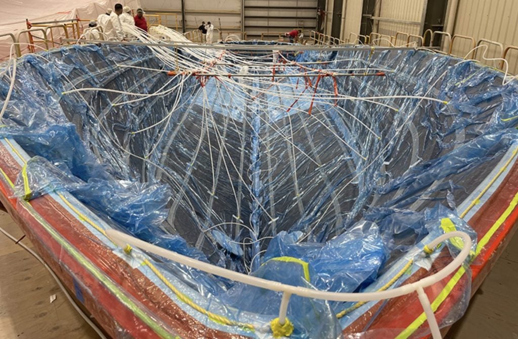 A Viking 90 sportfish begins the resign infusion process at the Viking factory. 