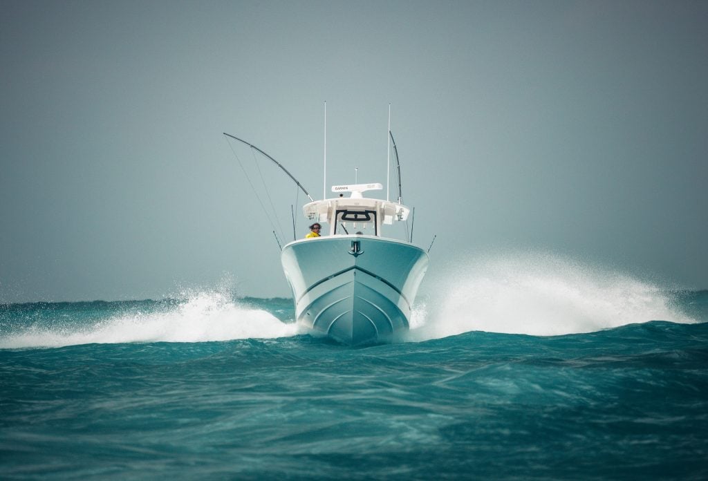 Center console running on the water. 