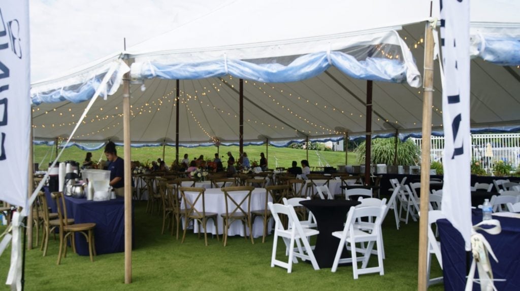 Princess Yachts event tent seet up on the lawn at Champlin's Resort.