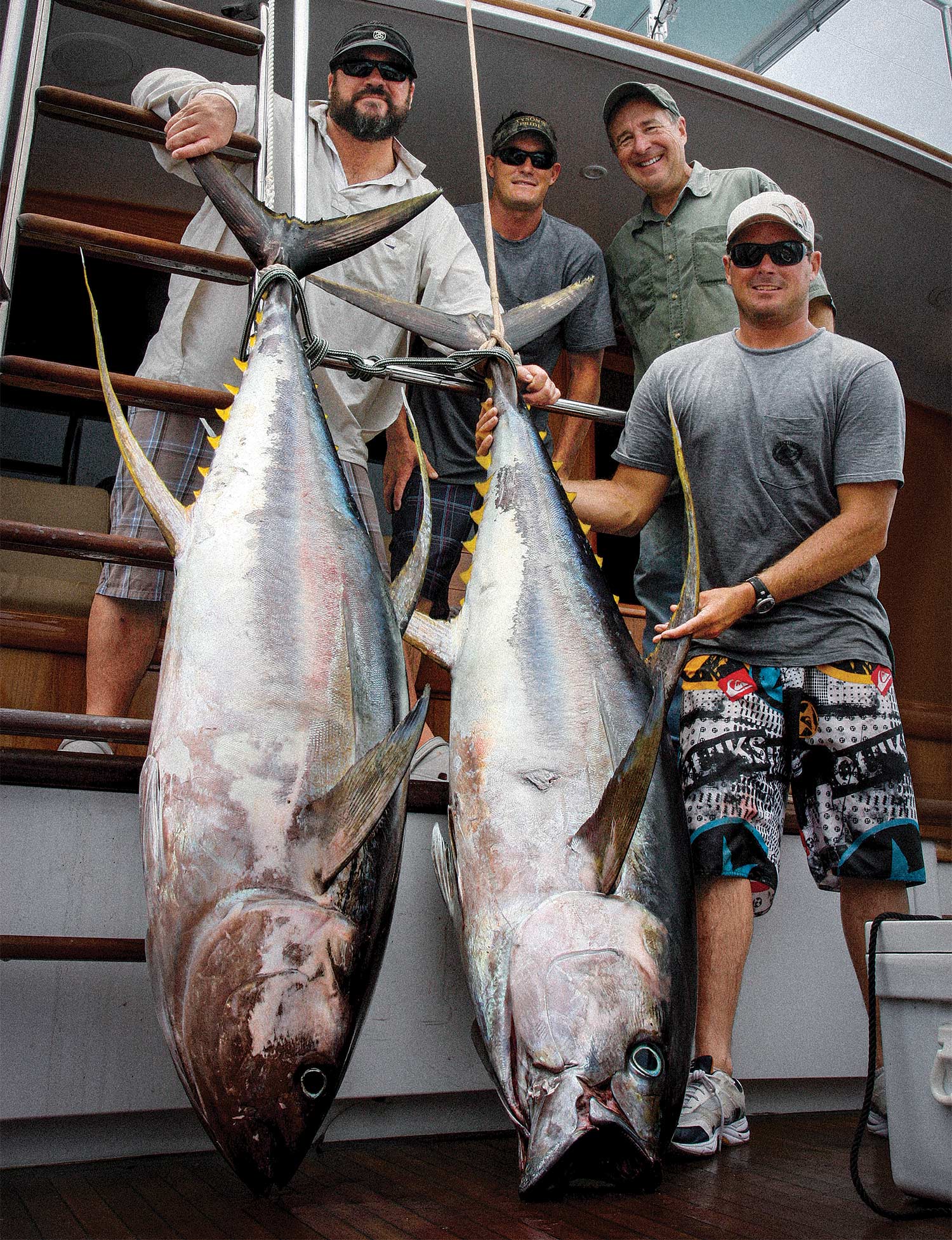 Anglers with fish in cockpit