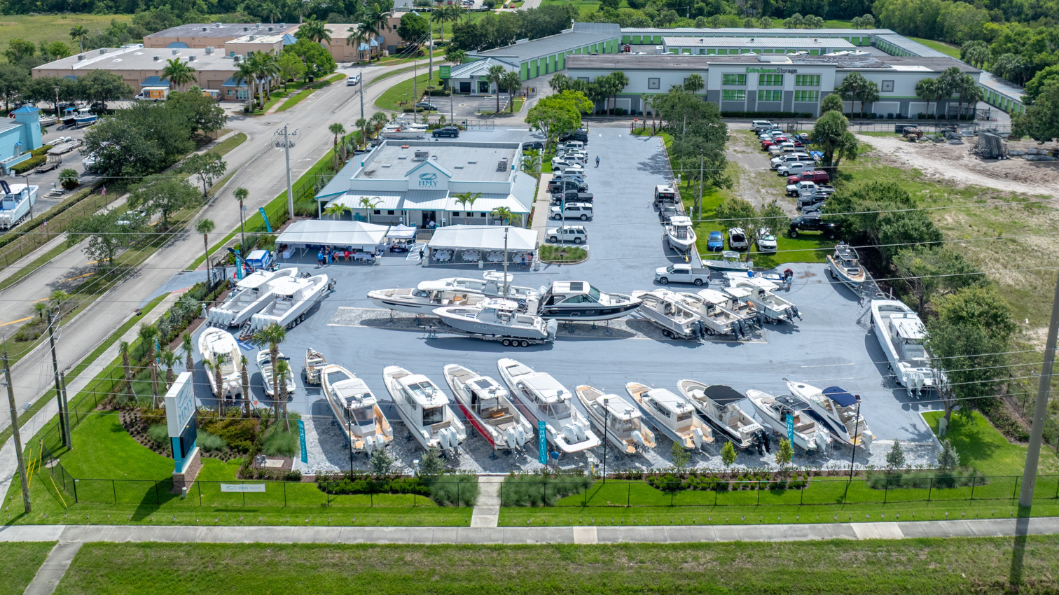 A drone shot of the HMY Gran Park office in Stuart Florida with boats for sale on display. 
