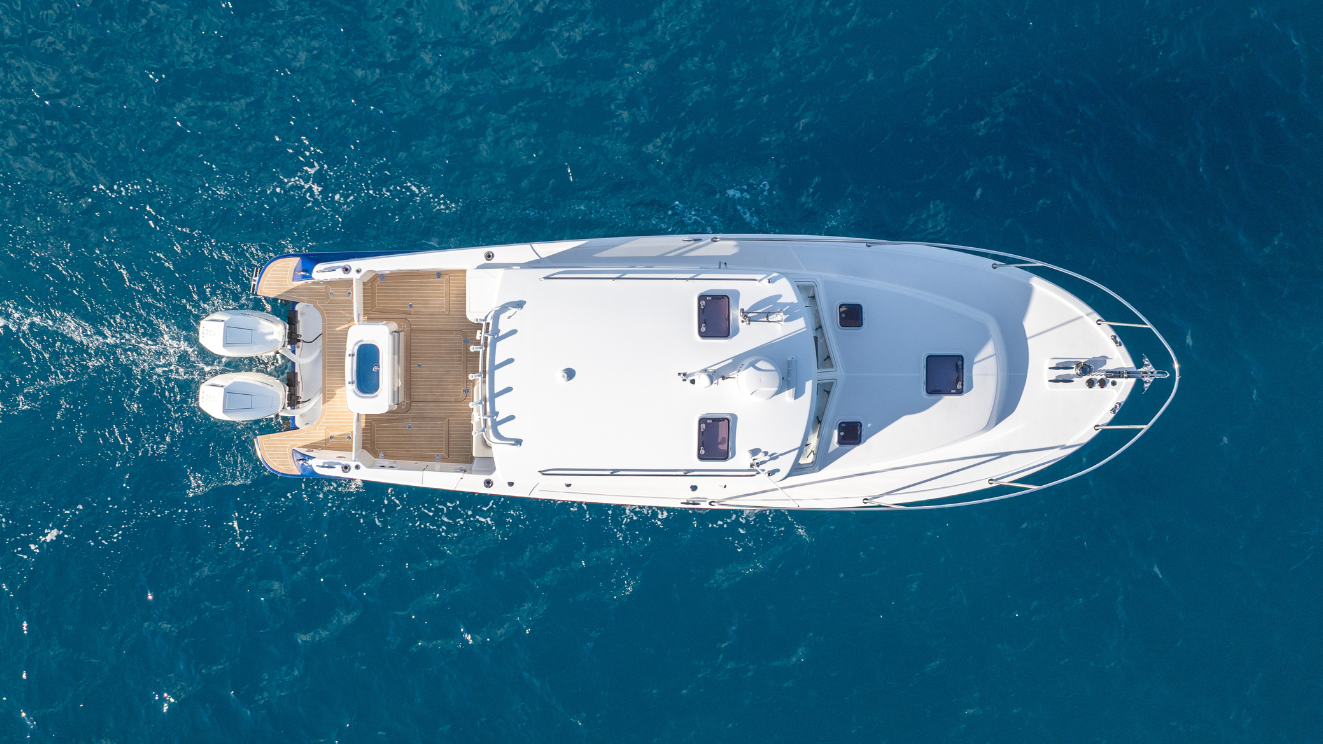 MJM 38RS drone shot of boat sitting idle in blue water